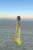 I love love the dress!!!!!!!!. It fit me perfect on the hip area but I little loose on the chest. I don't mind because I always have that problem so I know how to make it work for me& I got so many complements I was afraid of the color been to bright. But no worries if you have the same concern. Is perfect for a beach weeding&. Best purchase ever!!! - Lorena M.