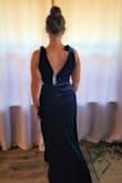 I bought this dress for a winter wedding, and I cannot wait to wear it. The color is more vibrant in person and the fabric is super soft and stretchy. The only concern I have is that it is low cut in the front. - Rachel O.