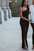 Highly recommend this dress. It's comfortable and fits true to size. The slit rises a little as I walked so I had to be mindful of it rising up. Other than that. I love It. - DeAndra Y.