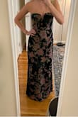 Pretty dress but it wasn't what I expected. The emerald was darker than I anticipated so it blended in with the flowers so it didn't give the pop I was hoping for. The zipper was also extremely touchy. Kept getting stuck in the fabric and so out of the MANY times I tried zipping the dress I could only get it to work one time. Ended up returning the dress. - Bethany K.