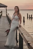 I had a small family wedding and didn't want to pay over 1k for my dress. So glad I found this dress! I tried a bunch of dresses from Lulus, Revolve, Azazie, and more and this one was by far my fav. I'm 5'5" and 140 and didn't need any alterations at all. The strings in the back help with sizing and make it perfectly flattering. I would 10/10 recommend! - Christina T.