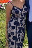 I'm typically a medium but I ordered the small based on the reviews. I had the same problem with the top part of the dress - it was way too big.  So I had the top taken in and cups sewn in. The rest of the dress fit perfectly. It was beautiful and I got a lot of compliments. - Laura F.