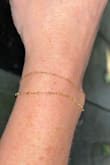 Love this bracelet! I wear it all of the time and later it with others. I never fake it off. - Beth T.