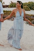 Love this dress and wore it for beach photos but it's very long and I'll definitely need to have it hemmed a good 4-5 inches off the bottom. - Chitra P.