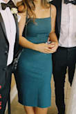 Got this dress is a size large purposely sitting that it wasn't super snug. I have the same dress is black in a medium that is a little more tight fitting for less formal events :) The material is amazing very thick and flattering and comfy yet classy, I want it in navy blue next. 10/10 my favorite dress. - Sarah B.