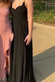 I loved this dress!! The only part that was a little annoying was the neckline. We had to alter it to make the neckline stay where we needed. - Olivia P.