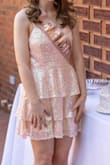 I loved this dress!! It ran a little large, but I'm not sure I would fit into a small. Not too noticeable. - Olivia P.