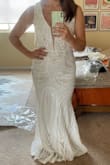 I am definitely sounding like a broken record but agree so much with the other reviews for this dress. Fits great, in person seems way more expensive than the price, and really love the pattern and details. Very excited to be wearing this dress at my elopement! - Emily M.