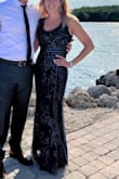 I just wore this to a wedding and have never received so many compliments! It fit perfectly and best of all you can wear a regular bra with it. I am 5'9" and it was long enough to wear 3" heels with. So happy with this dress! - Jamie B.