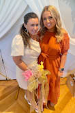 This dress is so cute! Other people wrote about how it looks baggy but the belt breaks it up. I loved it! Wore to a friend's bridal shower. - Erin O.