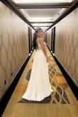 I don't usually write reviews but I definitely need to for this dress!! I'm just in love. I used it for my chapel wedding in las vegas and all the people (even strangers) stopped to tell me how beautiful my dress was. it was prefect fit,I ordered size 2, it is a bit longer for me because I'm just 5'2. I didn't have time to trimmed it but nothing that would bother me, i think it looked even more beautiful like that. It looks more expensive in person than it is, great quality. - Thamara F.