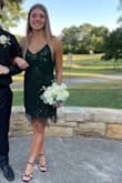 My daughter wore this to homecoming and got tons of compliments on it. Such a cute dress! It was a little big, but has adjustable straps, so no alterations are needed! - Catherine B.