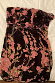 I recently wore this dress to my cousin's wedding. The dress is beautiful but the outer velvet layer is poorly made and within an hour of me putting it on, it split down two seams at the bust. I spent the entire evening trying to hide the rips in the dress. While I really wanted to love this midi, it's not worth the money and I will be asking for a full refund. - Colleen M.