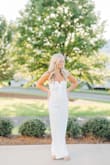 This is a beautiful jumpsuit for any occasion. I wore it for senior photos and it photographed so pretty! I am petite, so I had to have it hemmed, but other than that, it was a perfect fit! - Melanie M.