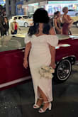 I bought this dress for my elopement and I loved it! I'm 5'3 and hemmed it even though with heels it would have been just fine but I wanted it at my ankles. I got so many compliments. The fabric is thick and lined. Not see-through at all. My favorite part was the sleeves, which I ended up keeping down most of the time. It was also super comfortable. It does run a little big but I'm glad I went with a medium because I was moving around a lot and I also ate so much that day so it worked out and I felt beautiful. - Maricela P.