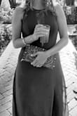 This dress is as beautiful in person as it is in the photos. It is quite form-fitting so it isn't for those that can be self-conscious about their stomach or hip areas.
The lace on the sides of the breast area is also distracting throughout the night. - Jami S.