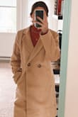 It is a gorgeous jacket but I will be having it taken in by a tailor and have the sleeves shortened a bit. - April P.
