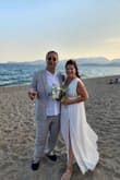 I got married on the beach in Greece and this dress was absolutely perfect. It was about 85º and I was relatively comfortable... the fabric was flowy and breezy. I had cups sewn in so that I wouldn't have to worry about a bra (or bra straps) showing - highly recommend going this route. I felt glamorous and sexy... but not too sexy. - Kimberley H.