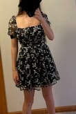 I got this dress for homecoming and it did not disappoint! It looks exactly like in the picture. The reason I gave this dress 4 stars instead of 5 was for two main reasons. First, the zipper was clearly not very well made. I needed two other people to be able to zip the dress up and down- it takes a very precise angle to be able to do it. The other reason was that this dress didn't have a built-in bra. This was a little annoying since the neckline and backline makes it impossible to wear a regular bra. Would have preferred a little more coverage in the chest area, but it worked out fine in the end and still looked great! Definitely recommend. - Tere K.