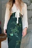 So cute but definitely wouldn't recommend it for the girls with smaller chests, very deep v-neck and even though the straps are adjustable, if you make the straps for the top smaller, it will become way too small in the armpits. Also another important note, the dress is very long!!! - Charlee G.