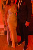 Definitely fit the theme of the evening in this dress. Be prepared to turn heads, maybe a bit of that is how high the slit is haha. Fit very well. I tightened up the strap with a tailor to feel a bit more secure and had it hemmed. - Justine S.