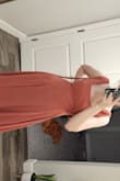 I wore this for my engagement shoot. It was a little long, but I like that. I am a 30G, and did have to sew the waist a little bit smaller but it fit my larger bust. - Alexandra W.