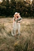 Fits perfectly, the dress looked beautiful in family photos. - Gina D.