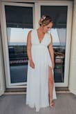 Had a small wedding in Italy by the ocean and this dress was perfect. Such amazing quality for the price. No one could believe that is what I paid! Had to get the bust altered to tighten it and have the bottom shortened a little. Highly recommend. - Katie S.