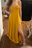 The color on this dress made me feel like Belle from Beauty and the Beast- it was beautiful! The cup size feels a bit too large and I personally wasn't a fan of the material pattern around the breasts either. It's also much longer than I expected - I would have had to wear at least 4" heels just to avoid dragging the dress on the floor. This dress was meant for taller, bustier people sadly! It would have been great for a wedding or a fun summer outing. - Rhonda K.