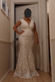Liked the dress and quality of the lace but there was a pink/orange line on the front hip that I noticed before even taking out of the package so needed to return it. - Jennifer B.