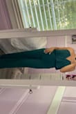 It fits so well and has very stretchy material. I am 4'11" so I do have to get the bottom trailered but great overall. - Becca M.
