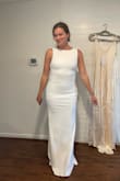 This will be my wedding dress. I love how stretchy it is. I can gain or lose weight before the big day and this will still work for me! It passed the squat test, so you know I will be dropping it low on the dance floor all night. I'm still trying to figure out what shape wear to buy. It is form fitting so it will show spanx lines and bra lines. The open back is also a factor as well. *I am wearing 2 in heals in these photos. - Carly O.