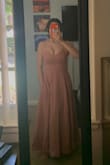 Got this dress for a baby shower I'm going to and thought it was a great length and color for the occasion. Dress is a nice material and has pockets which is always a plus. The dress is a bit long for a midi, but I am short so that may have to do with it. My only complaint is the chest area of the dress is definitely small, tight, and I find myself spilling out of it. The rest of the dress fits perfectly, but might not be the right dress or size for someone who is larger chested. Overall, I would recommend this very pretty dress. (Shipping was also very quick and received it within a few days of ordering). - Emerson W.