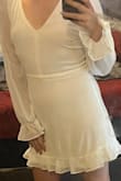 Ordered this dress in a size small (I usually wear size 2). The dress is a nice material, the back is beautiful! The sleeves are a little long but it works. Dress is very free flowing but still hugs the hips just enough to show curves. Very happy with the dress - Natali S.