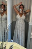 I never know what size to get& 
Im 165lb, 5'5" and 38DD and went with L. 
First one I ordered had a small defect on straps so it made dress look bad. Customer service was amazing and they sent me another one immediately. Plenty room for boobs and snug on the rest of the body.
Now, I did have to have it tailored. It's very long so I shortened it to hit the ground but not drag for a mile (personal preference) I was worried about the fact that I need a bra (always) but with open back and low cut front I wasn't sure what to do. Like I said, I took it to tailor shop and she immediately knew what to do - she simply tightened (shortened) straps and it looks amazing! now I'm not worried about a boob falling out. Pictures are of the before tailoring.
Picture for length reference. Also.. the zipper will not close if I gain any weight. I have wide ribs I guess. - Sol G.