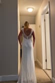 Love the back of this dress, material is good with some stretch. - Arielle P.
