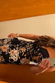 Loved this dress. The colors are stunning. Fit beautifully in the bust. Material quality was great as well. I am short and length was very nice on me. Hit right above the ankle and the slit was mid-thigh. - Danielle K.