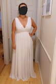 Ordered a Large and XL, tried the large and it fit perfectly so never tried the XL. Material was light, and airy and the dress was very comfortable. Still long with 3" heels, but that's the only complaint, the dress is lovely and I'm excited to wear it. - Jennifer B.