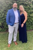 I ended up getting an extra small for a slightly better fit. The stretch definitely allows for a smaller fit if you're on the fence. Simple yet elegant. Just be careful how you sit because the slit is a little high. - Jessica W.