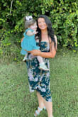 I was looking everywhere for a dress to wear to an October wedding and came across this one. When I got it in I was VERY pleased and knew I found the perfect dress! It was a little snug in the bust but it wasn't uncomfortable. I received so many compliments. Very figure-flattering and perfect if you need to chase your little one around all night, like me. I ordered the XL. If you are hesitant just purchase it, you won't regret it! - Kayla G.