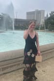 I had a black tie optional wedding and this was perfect! The floor length hem kept it formal but the mesh legs kept it young and fun. Lots of my family and friends doubted the floral and frills for me but I had faith and they saw it day of and said yes that is a great dress. 

I used 2 safety pins to lock down the top drill inside the bust a bit and if I could do it again I'd probably either sew down the black top grill in a few keys places. 

It did show up wrinkled and that material is almost impossible to de wrinkle even having it on a hanger while I showered twice. Luckily I doubt anyone else would notice on the black and if so it looks intentional on the frills.

I have a bigger bust on a small waist (30DDD) so the straps being adjustable was perfect to reveal just what I wanted. Be very careful tightening that strap I could tell it was a 'this could be broken pretty easily' type thing and then the dress would be ruined, but if you're careful setting it up it stays put and it's fine. Loved it! - Kitty H.