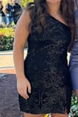 The dress was way too big and kept falling down. I'm normally a small, but would definitely get a xs. Also, it gave me little cuts on my arms. Super pretty dress though. - Cameryn M.