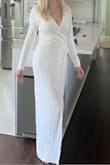 Beautiful, not skin tight. Absolutely love the material, the sequins are of high-quality and the slit in the dress as well as the V-neck are so sexy. I got three dresses to Try on for my wedding rehearsal night I think this one would be perfect if it was in the winter. - Danielle D.