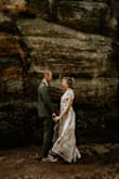 I got married in this dress! It fit so perfectly and was so comfortable all day. I'm short (5'2) and most long dresses are absurdly long on me and would require hemming. the high-low hem was perfect and I needed no alterations. It was flowy but stayed put even in windy conditions. So so glad I chose this dress for my wedding!! - Leslie B.