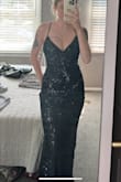 This is the BEST black tie dress I have ever bought. It fits like a glove and the fabric is super stretchy so it hugs your curves. The lace-up back allows for a custom fit, and it's very supportive in the chest area (it even gives you an extra lift). I will definitely need it hemmed because it's long, but I'd rather have it be too long than too short! - Cameron L.