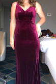 I wore this to a black tie fall wedding. The color and material felt perfect for the occasion, very rich and luxe, and I stood out from all the boring black dresses (in a good way). I started with a size M (my usual size) but there was a tiny bit of gapping around my waist so I sized down and the S fit like a glove. Super flattering and modest in the bust area, and the fabric was heavy and smoothing so I could go without a bra or spanx, and it was giving enough so it was easy to move, sit, and dance in. Length was perfect with 3 inch heels. I also had it balled up in my bag for a day of travel before my event and it didn't wrinkle or get any weird dents in the velvet. Buy it! - Jenny T.
