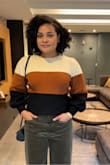 Adorable and comfy sweater for the fall. The colors in the color block are nice and the bell sleeves give a little added touch of cuteness. - Stephanie M.