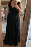 I got a size medium and I could not get it zipped. I'm between size small and medium, so I'm not sure why this one ran so small in the bodice. Tried it on with high heels (I'm 5'2) and it would've needed to be hemmed a bit. Neckline is nice and loved the slit. - Shirley
