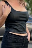 I got so many compliments wearing this! It fit well, considering my bust size (32F, 34" circumference) versus waist size (27"). 
I could almost get away with no bra but I wanted a little extra support for my ladies. There's not much of a stretch to the material. It's perfectly modest with just enough edge. - Kristie M.
