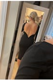 The back of this dress is stunning and the fit has a decent stretch to it. I have a athletic built and probably could have worn a small too if I wanted it to be a little more snug and for the sleeves to be a tad shorter. I ended up returning though because it felt a little to stiff and too business like for the type of wedding I was going to. The material is definitely thicker then what I was expecting so it's good for a cold weather event. - Jenna A.